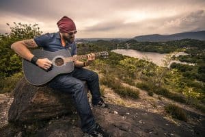 Gitaar gehoorbescherming banaan in je oor